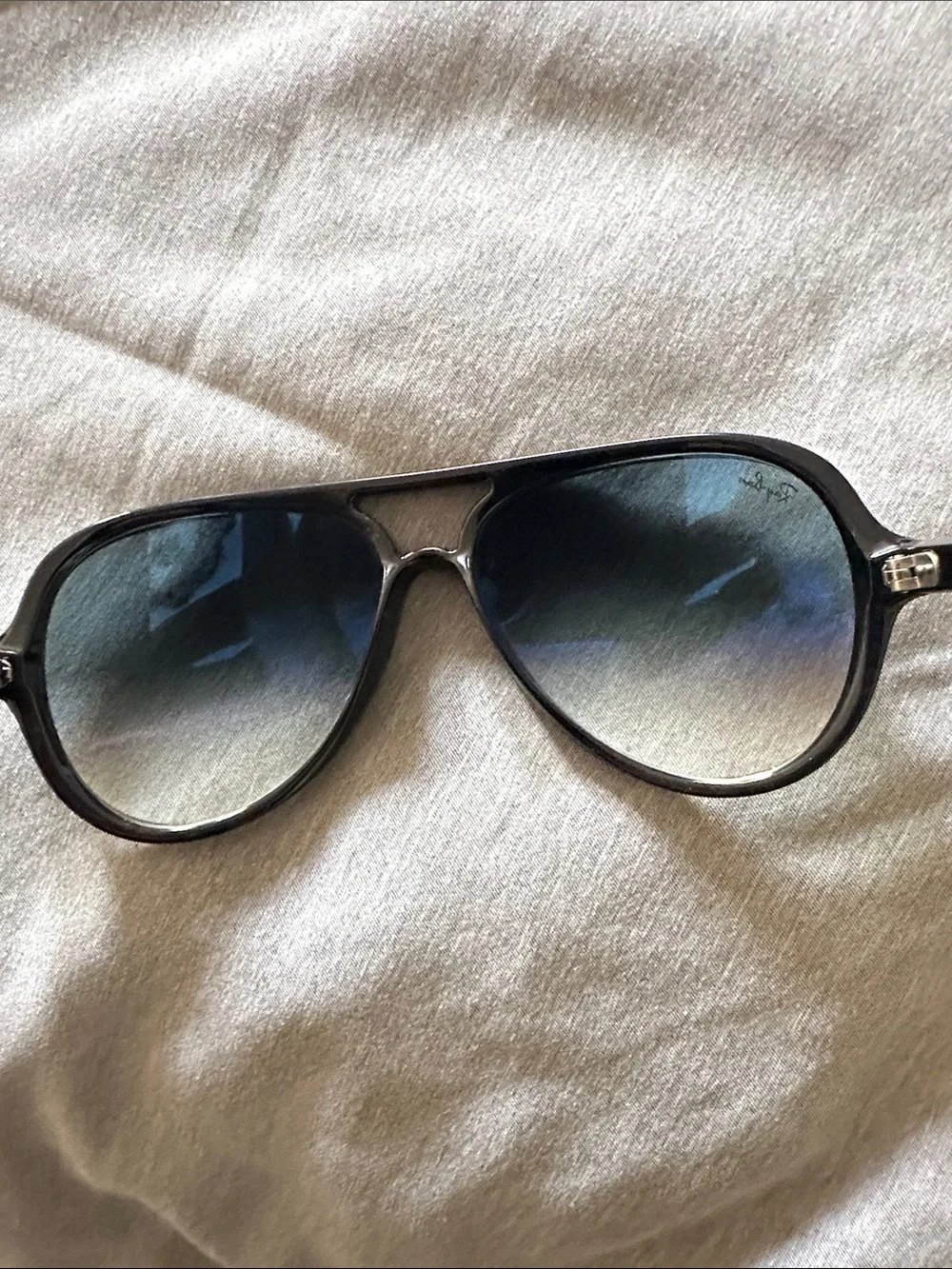 Ray-Ban Black Frame Sunglasses with Blue Tinted Lenses